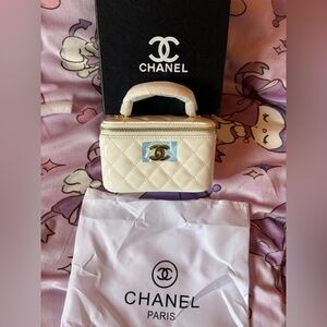 white quilted mini vanity crossbody bag